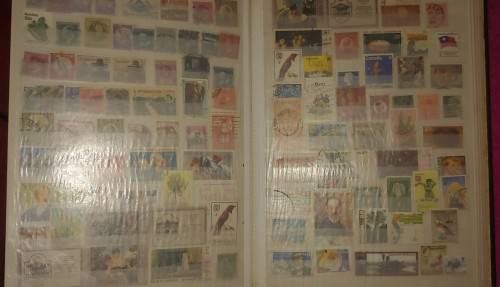 GREEN STOCKBOOK MIXED WORLD FOR SORTING AS SHOWN IN PHOTOS 15 PAGE 30 SIDES