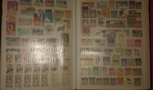 GREEN STOCKBOOK MIXED WORLD FOR SORTING AS SHOWN IN PHOTOS 15 PAGE 30 SIDES