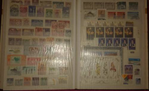 GREEN STOCKBOOK MIXED WORLD FOR SORTING AS SHOWN IN PHOTOS 15 PAGE 30 SIDES