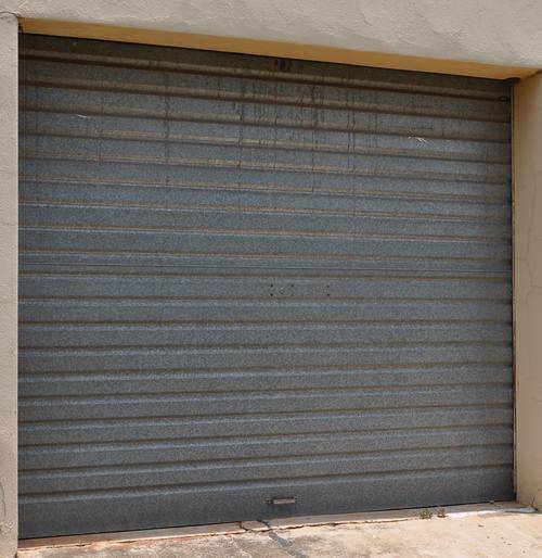 GARAGE DOOR (METAL) - very well looked after and in smooth working condition