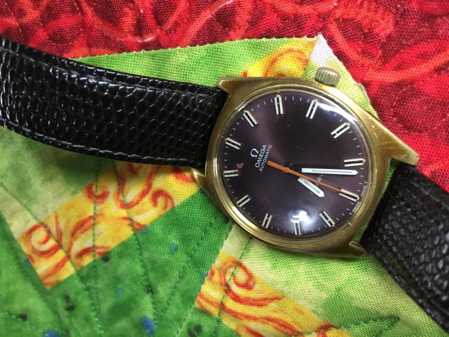 Stunning oxblood mens 38mm Omega Geneve