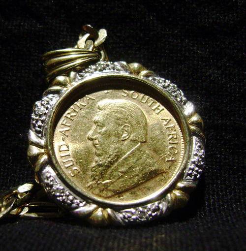## 1/4 OZ ## - Kruger Rand Set in Diamonds - ## With Chain ##
