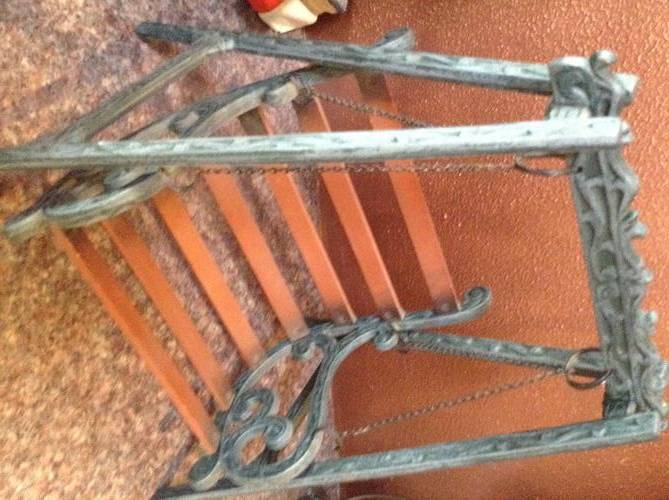 Dolls' swing (cast iron and wood)