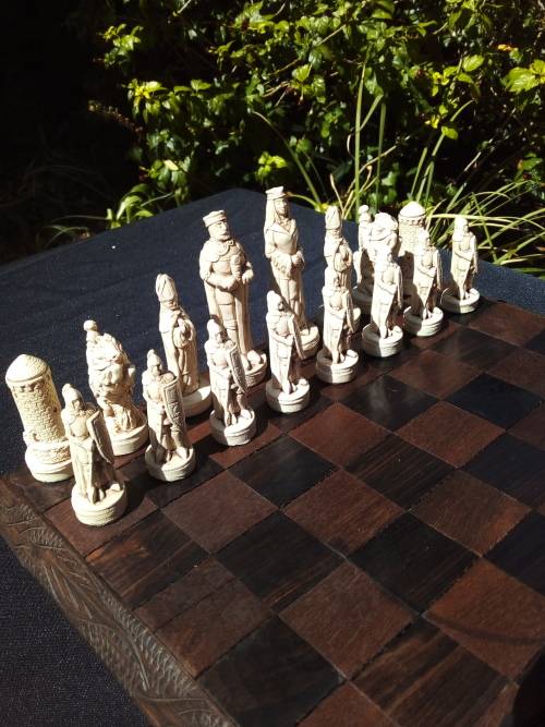 MEDIEVAL FIGURINE`S ON AN AMAZING HAND CRAFTED MARANTI WOOD CHESS BOARD