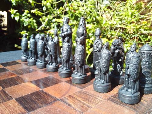 MEDIEVAL FIGURINE`S ON AN AMAZING HAND CRAFTED MARANTI WOOD CHESS BOARD