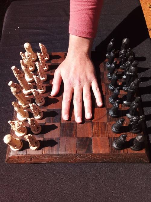 MEDIEVAL FIGURINE`S ON AN AMAZING HAND CRAFTED MARANTI WOOD CHESS BOARD