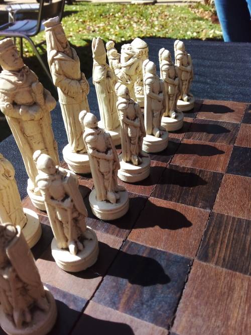 MEDIEVAL FIGURINE`S ON AN AMAZING HAND CRAFTED MARANTI WOOD CHESS BOARD