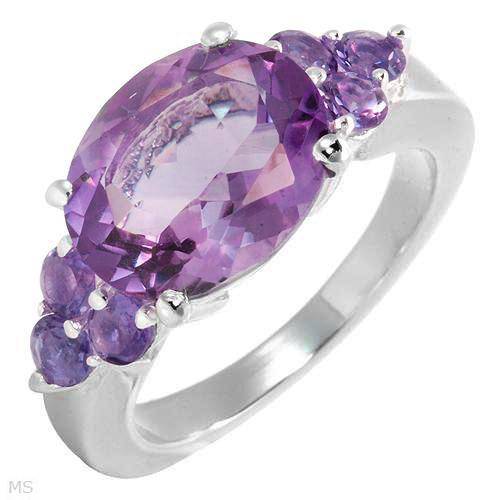 Please Read before you bid -Dazzling Brand New Ring With 4.55ctw Genuine Amethysts Well Made in 925