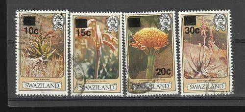 Swaziland. Group of  4 over printed Flower stamps. Used slightly hinged