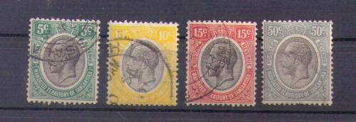 Tanganyika. Group of 4 stamps. Used/hinged/rust