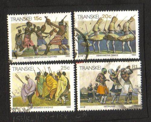 Transkei. 4 Used stamps hinged on paper