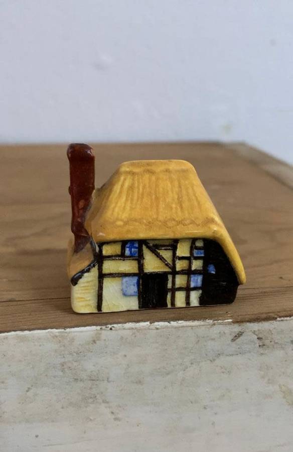 #88 Handpainted and signed ceramic thatch cottage