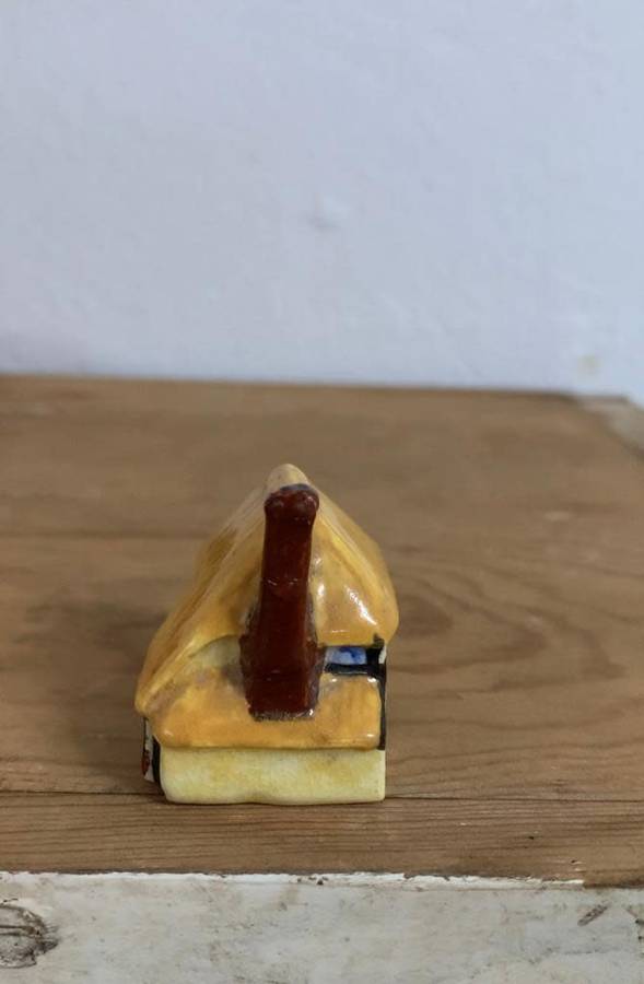 #88 Handpainted and signed ceramic thatch cottage