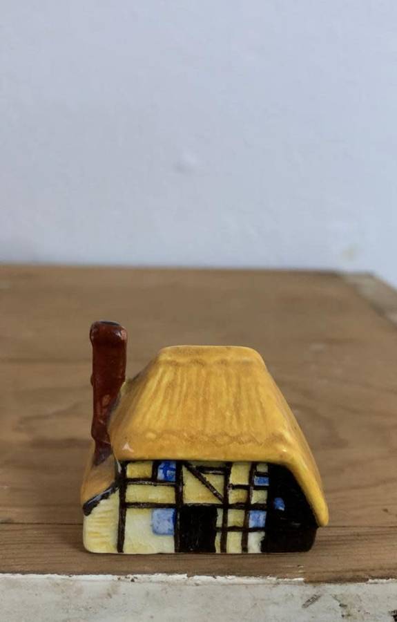 #88 Handpainted and signed ceramic thatch cottage