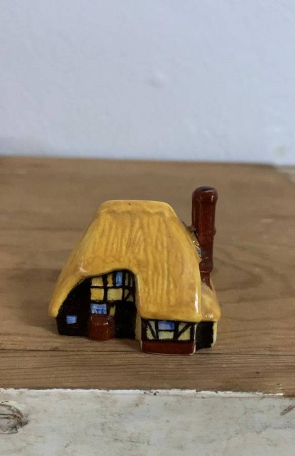 #88 Handpainted and signed ceramic thatch cottage