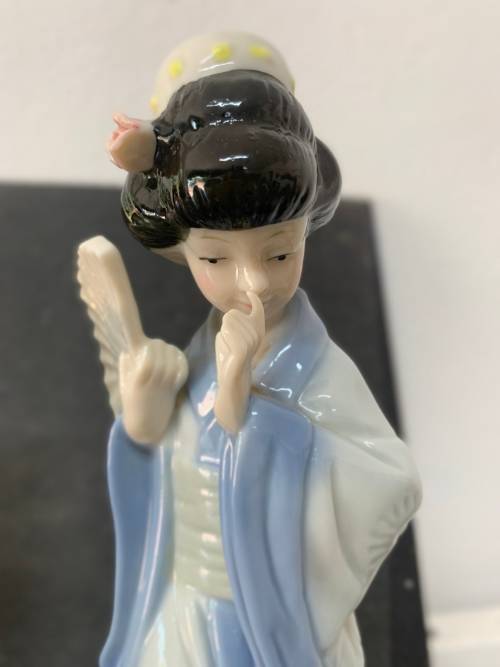 Pair Of Porcelain Geisha Figurines