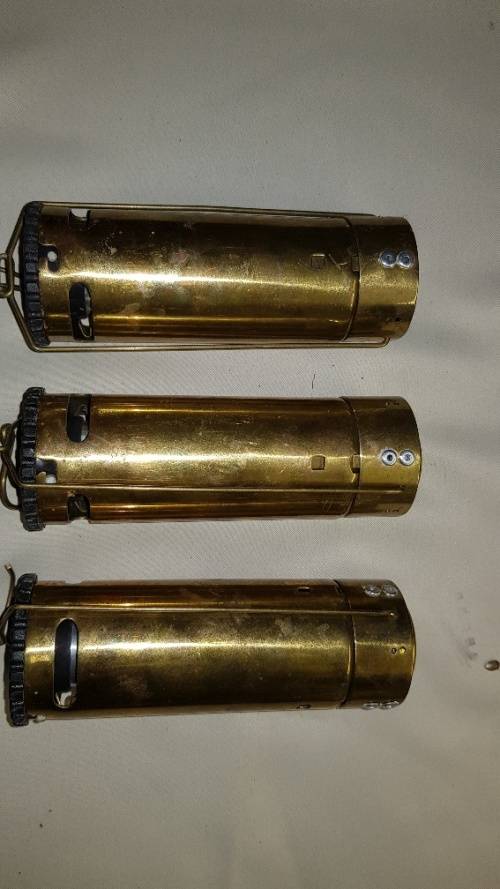 Set of three vintage brass bush lights.