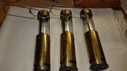 Set of three vintage brass bush lights.