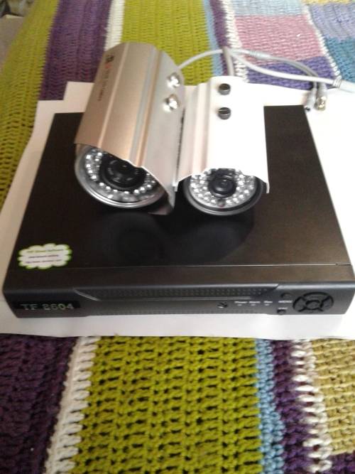 4 CHANNEL DVR INCL. 2 COLOR CAMERA ,REMOTE,MOUSE&POWER SUPPLY