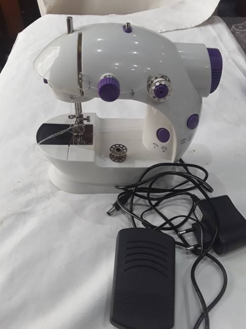 MINI ELECTRIC SEWING MACHINE