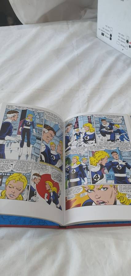 MARVEL HARDCOVER COMIC (THE INVISIBLE WOMAN)
