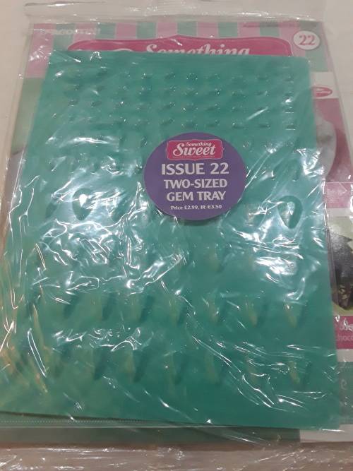 VARIETY OF 20 ISSUES SOMETHING SWEET CAKE DECORATIONS)EACH CONSISTS OF A RECIPE MAGAZINE AND A MOULD