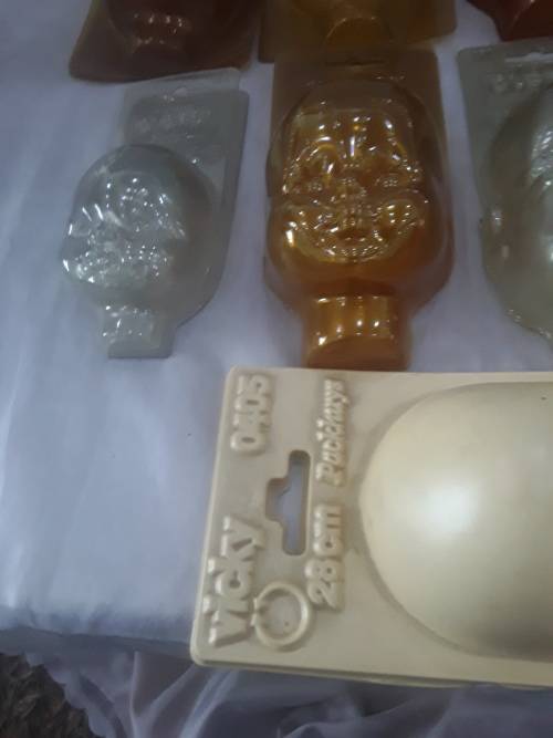 28 PIECES (DIFFERENT SIZE AND SHAPES)DOLLS HEAD MOULDS(UNUSED)