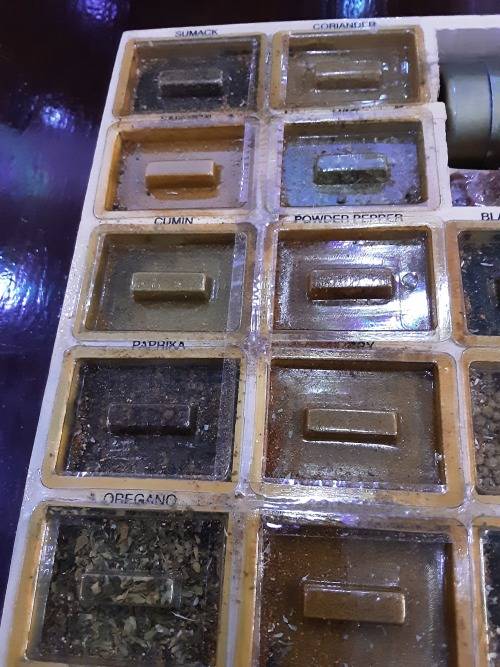 NATURAL SPICE BOX(17  LABELED SPICES IN WINDOW DRAWER INCLUDING A BRASS SPICE GRINDER)