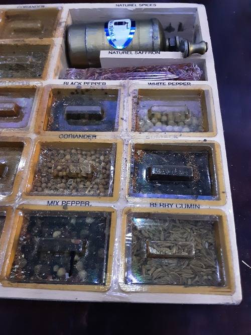 NATURAL SPICE BOX(17  LABELED SPICES IN WINDOW DRAWER INCLUDING A BRASS SPICE GRINDER)