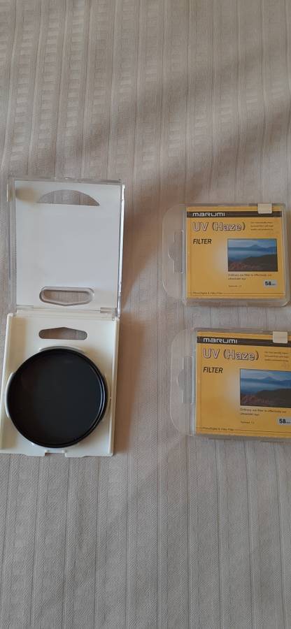 Canon Zoom Lenses with Filters and Backpack.