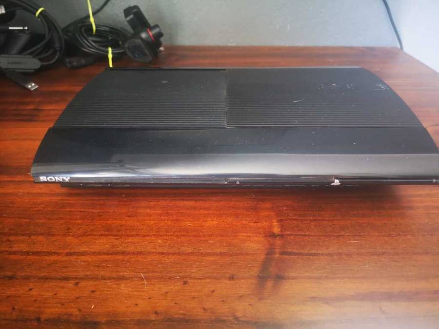 PS3 - 12GB Super Slim Console + 2 Controllers + Move Controller + Games