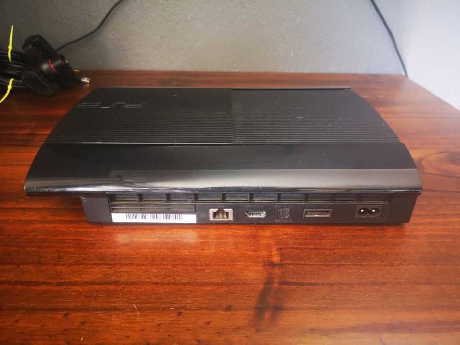 PS3 - 12GB Super Slim Console + 2 Controllers + Move Controller + Games