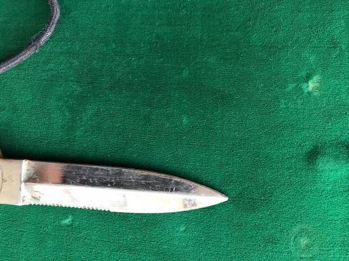 RECCE USED STAINLESS STEEL DAGGER WITH SOME RECCE CAMO TYPE STILL ATTACHED TO IT-TOTAL LENGTH 21.5CM