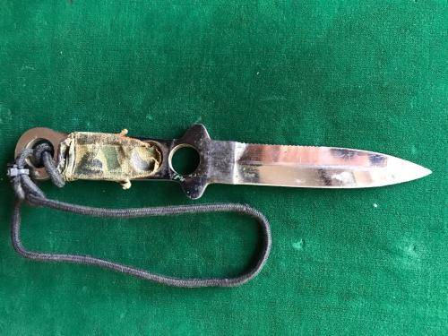 RECCE USED STAINLESS STEEL DAGGER WITH SOME RECCE CAMO TYPE STILL ATTACHED TO IT-TOTAL LENGTH 21.5CM