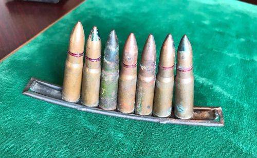 7,62 MM X 39 AMMO ON 10 ROUND STRIPPER DIP FOR THE SOVIET SIMONAV SEMI AUTOMATIC CARBINE (SKS