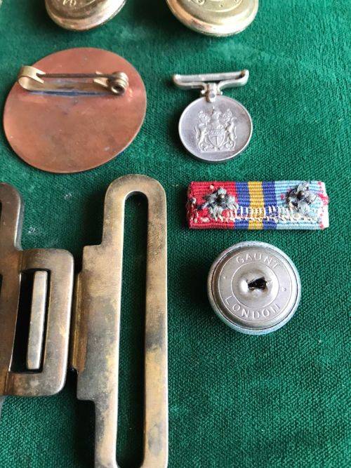 SELECTION OF 13 RHODESIAN BADGES ,MEDALS AND OTHER ITEMS-SOLD TOGETHER