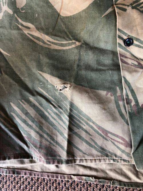 RHODESIA CAMO SHORT SLEEVE SHIRT SIZE MEDIUM-MEASURES 50 CM ARMPIT TO ARMPIT-SOME DAMAGE PLEASE LOOK