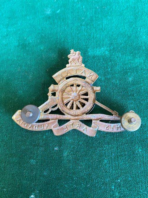 NATAL FIELD ARTILLERY,GILDING METAL CAP BADGE- WORN POST 1967-LARGE VARIATION- 2X SCREW LUGS
