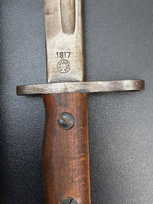 US PATTERN M1917 BAYONET MADE BY REMINGTON,RIGHT RICASSO MARKINGS OF THE US M 1917 BAYONET,SHOWING T