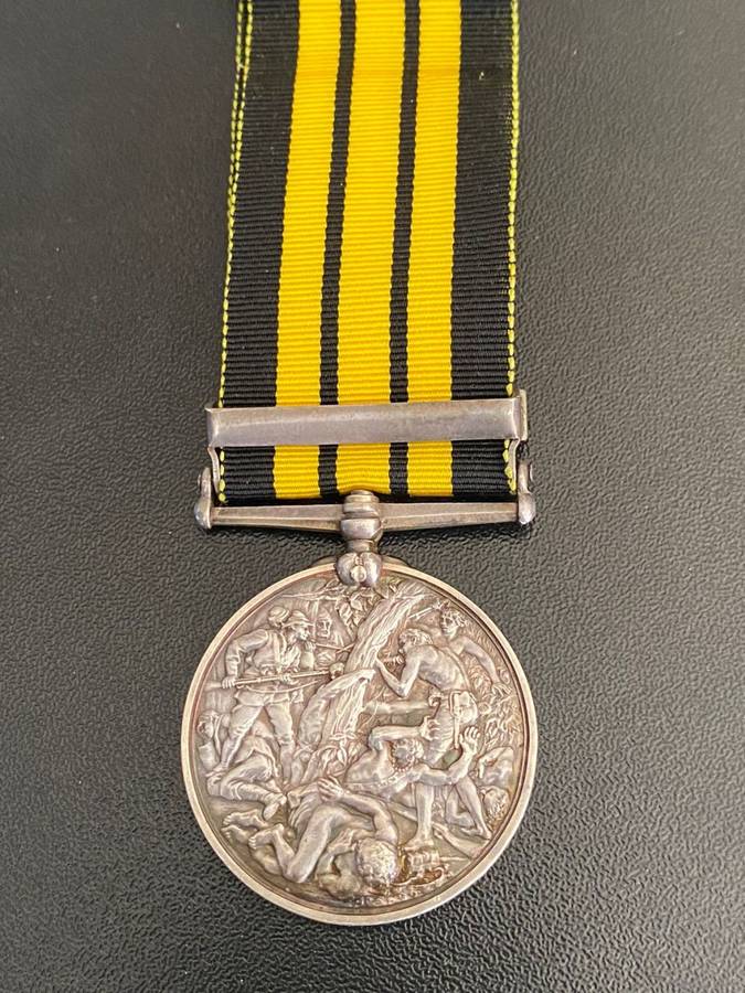 FULL SIZE (SILVER) EAST AND WEST AFRICA MEDAL WITH 1897-98 CLASP-AWARDED TO 675 PTR. SUANU AF01 LAGO