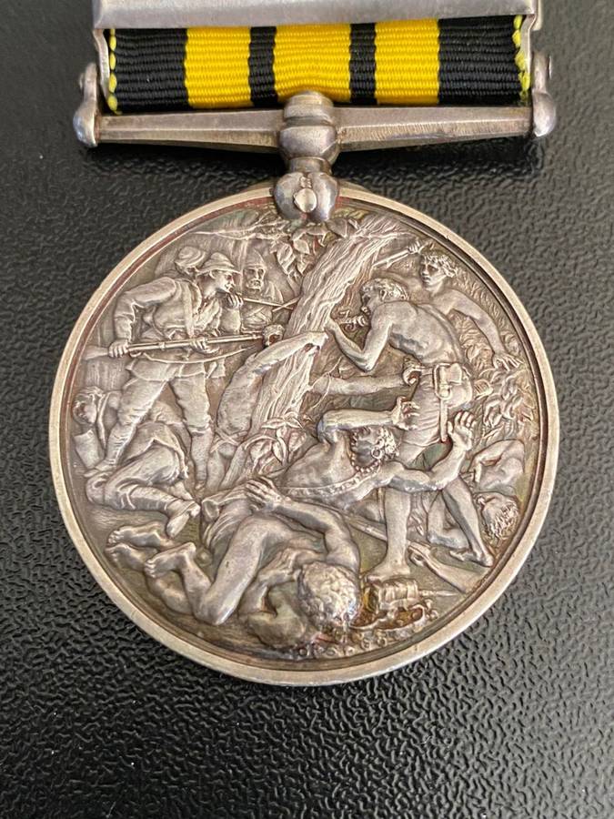 FULL SIZE (SILVER) EAST AND WEST AFRICA MEDAL WITH 1897-98 CLASP-AWARDED TO 675 PTR. SUANU AF01 LAGO