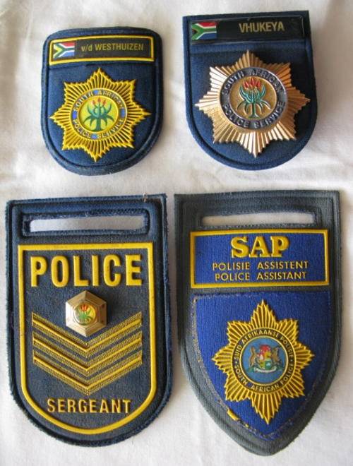 SELECTION OF SAP FLASHERS & NAME BADGES.