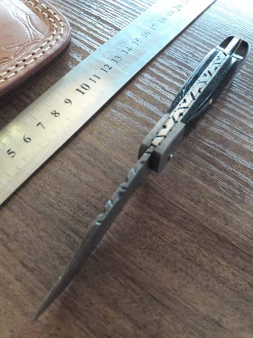 Handmade Damascus steel folding knife with BULL Horn handle scales