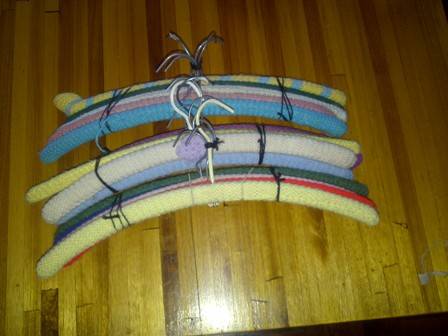 Fourteen Knitted Hangers for One Bid