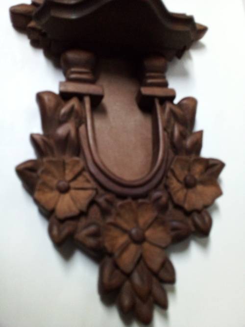 Decorative Carved Wooden Wall Hanging with Small Shelf