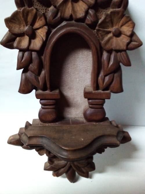 Decorative Carved Wooden Wall Hanging with Small Shelf