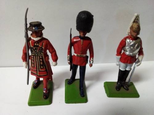 Three Small Die Cast British Figurines with Markings