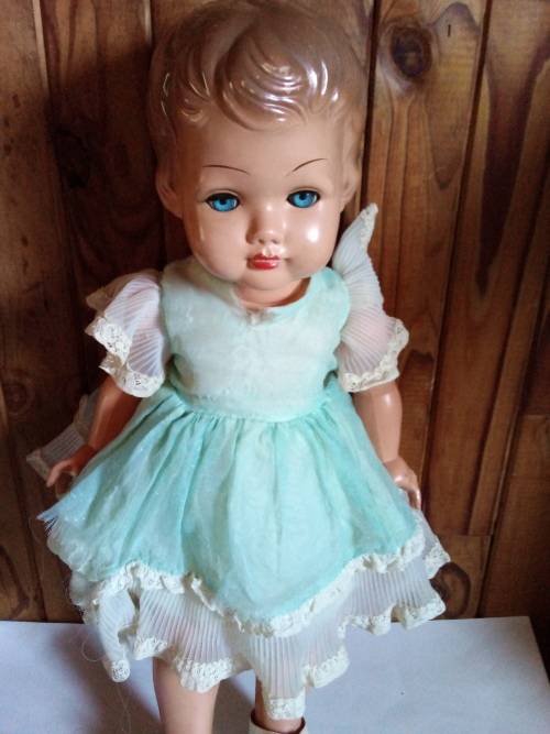 Old Vinyl Plastic Doll with Blue Eyes That Open and Close