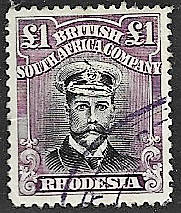 BSACo super  One pound fiscally used with feather in cap variety SACC 278? black and bright purple