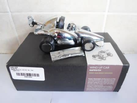 F1 FANS!! BOXED TROIKA WIND UP F1 CAR DESK PIECE DESIGNED BY HAUKE MURKEN & SVEN HANSEN WORKING!!